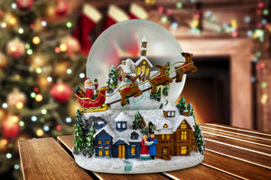 Santa w/ Reindeer Flying Over Village Snow Globe