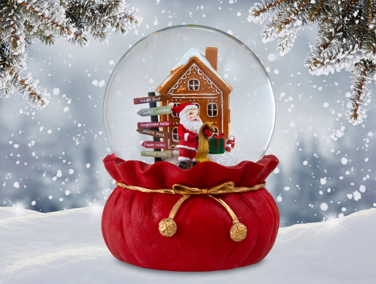 Santa Checking His List Christmas Snow Globe