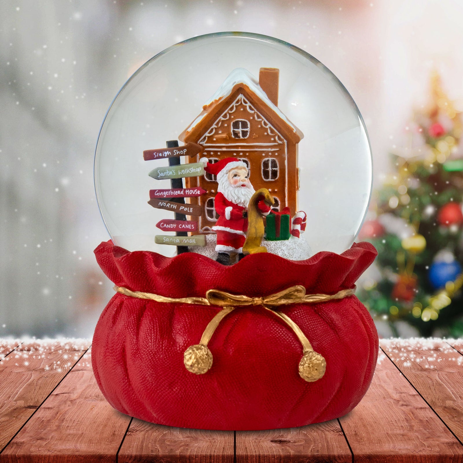 Santa Checking His List Christmas Snow Globe