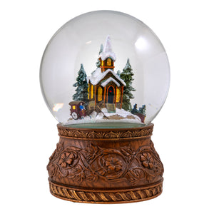 Rotating Carriage at the Village Church Snow Globe