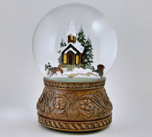 Rotating Carriage at the Village Church Snow Globe
