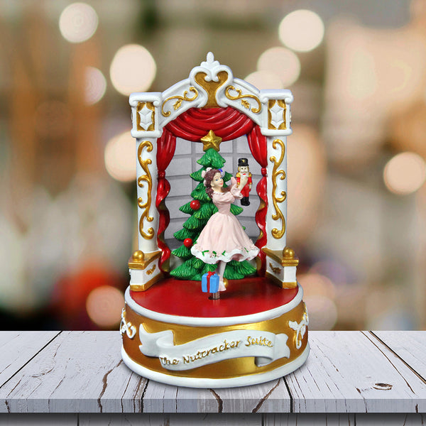Clara with Nutcracker Twirly Figurine - San Francisco Music Box